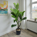 Tall artificial Fiddle Leaf Fig tree with large, dark green fiddle-shaped leaves and a detailed realistic trunk in a minimalist black pot.