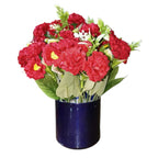 Artificial Red Carnations in Blue Metal Pot